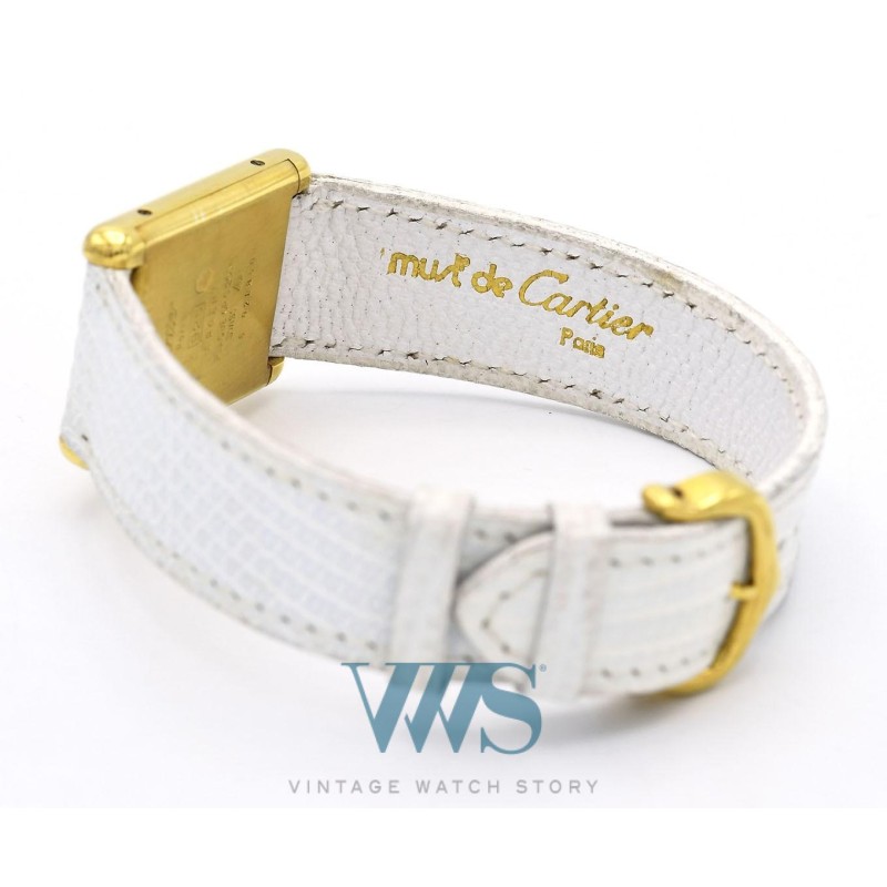 CARTIER (TANK HOMME MUST DE CARTIER / ROUGE CERISE  numéroté), vers 1988