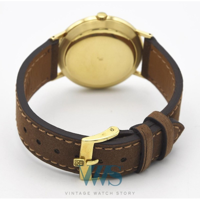 MOVADO (KINGMATIC LUXE / Or jaune / ref. 381), vers 1964