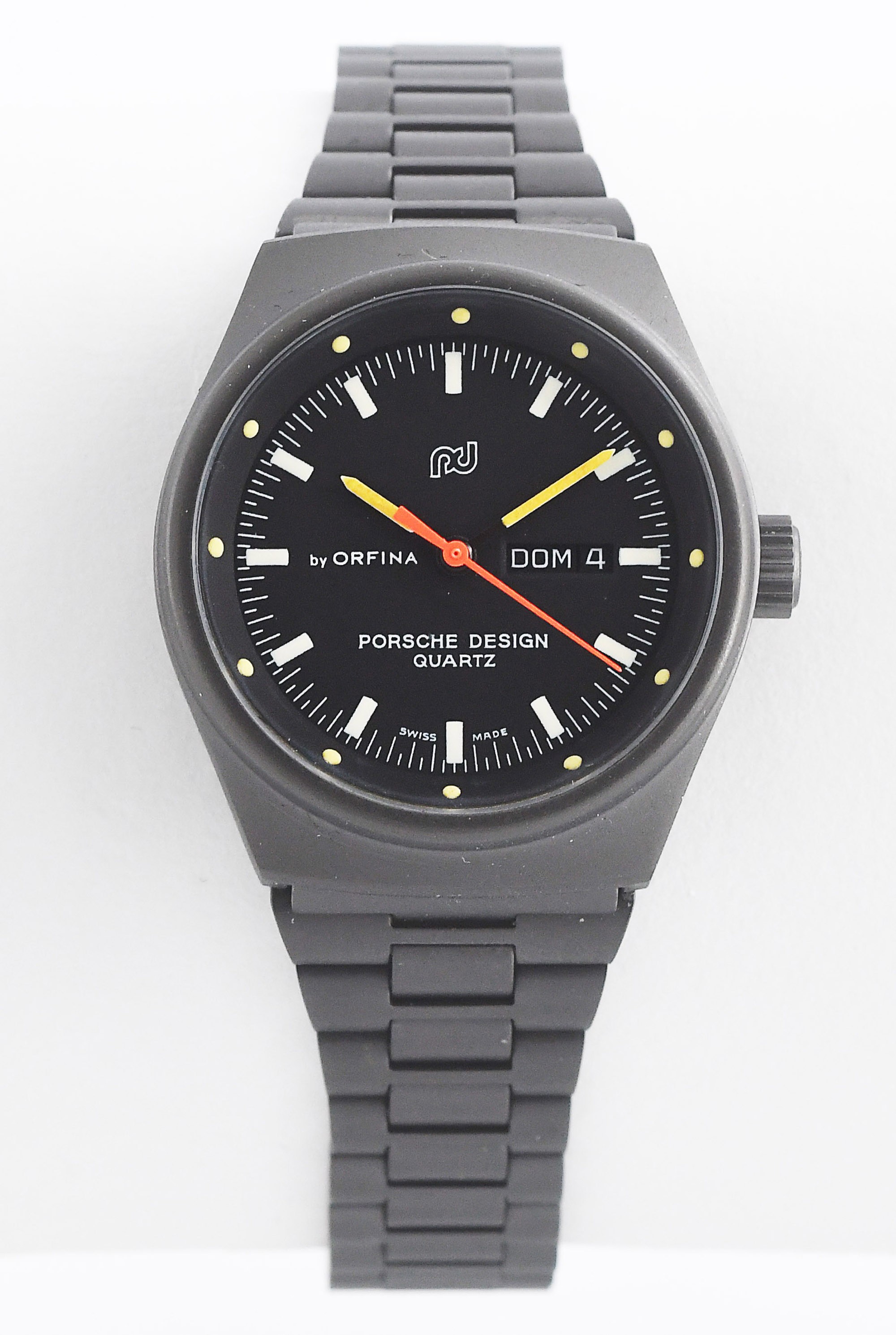 PORSCHE DESIGN (Lady Grise Aviation quartz - By Orfina Suisse – Cadran noir  / réf. 7050S), vers 1978 - Vintage Watch Story